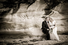 Couple sitting on rocks